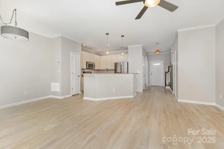 Updated fixtures for living room, kitchen and eat-in kitchen area.