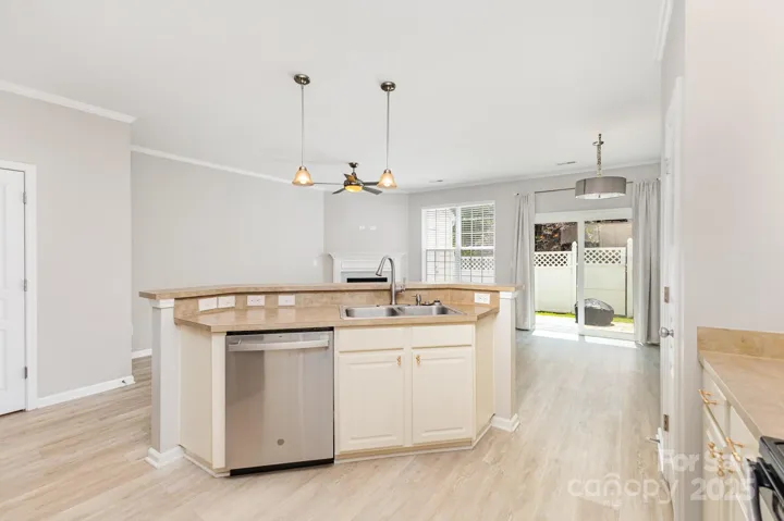 Open concept kitchen, living room, eat-in kitchen area with a breakfast bar, as well!