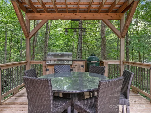 Pergola BBQ area with granite countertop, Big Green Egg and Stainless Sizzler Infrared Grill
