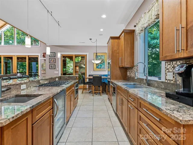 Large Kitchen with stainless steel appliances and beautiful granite counter-tops
