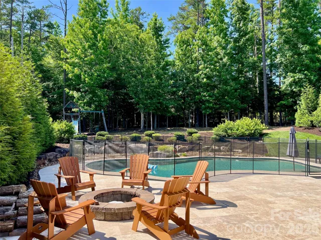 Fire Pit, Pool, Playground and trees