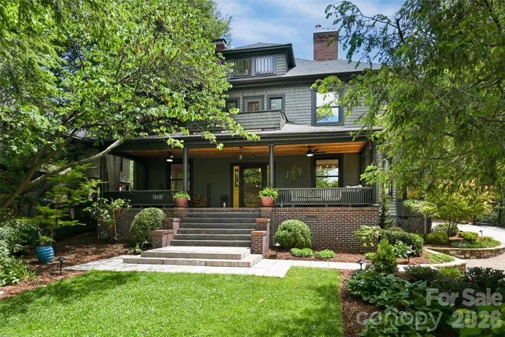 Built in 1905 this iconic American Four Square home exudes architectural charm from the moment you pull into the drive.