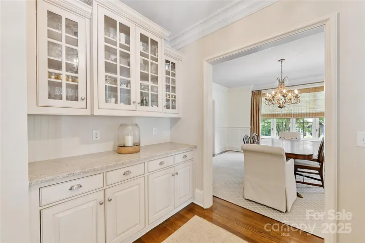 A graciously-sized butler's pantry between the dining room & kitchen aides with entertaining.