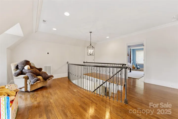A loft area on the third floor provides great space for reading or games.