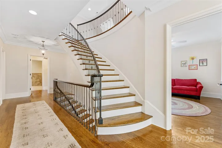 A second stunnng staircase leads to the third floor.