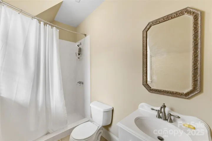 The full bath above the garage.