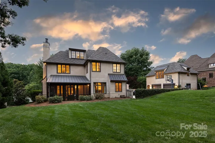 A twilight view of the rear of this spectacular property!