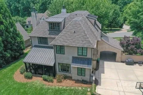 The screened porch and dormers on the home have copper trim on them.