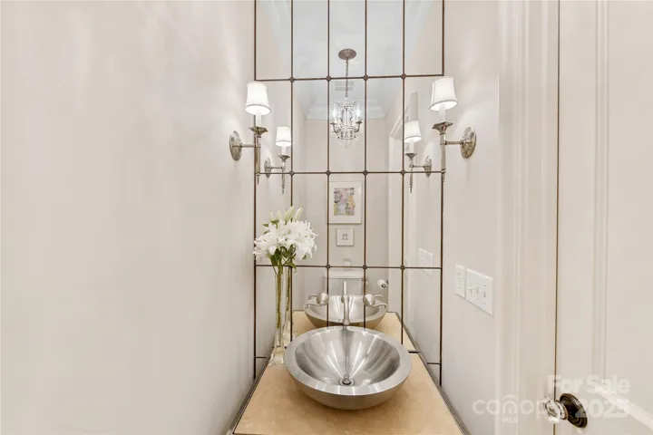 The  stylish main level powder room.