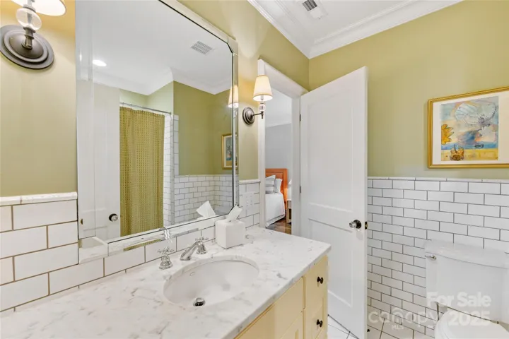Connecting bathroom to Bedroom 3 with hall access as well.