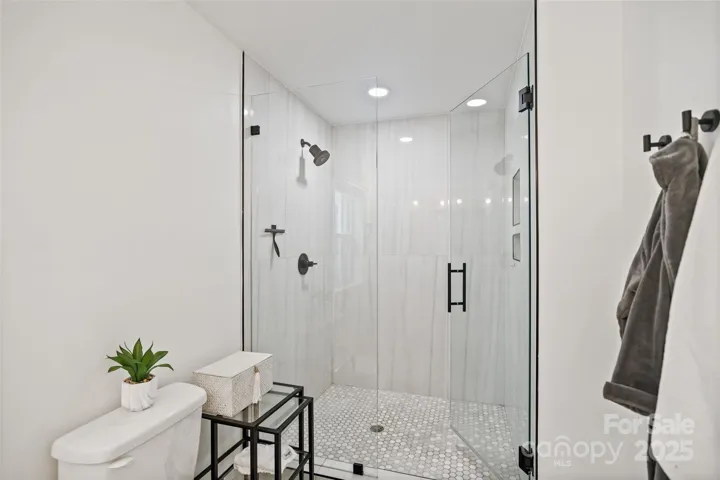 & floor to ceiling tile shower!