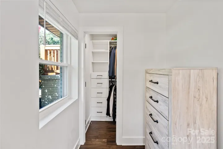 Custom closet with drawers + more hanging room when you step in