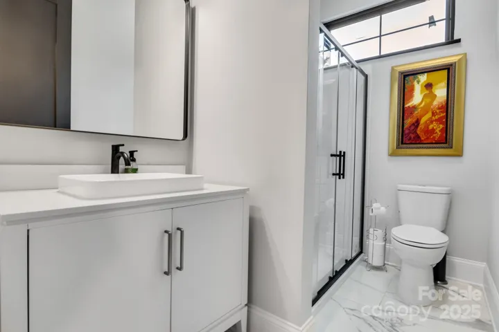 En-suite bath with shower