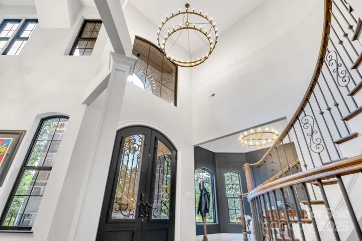 Entry french doors both open fully, as well as have screen windows that open and let fresh air in.