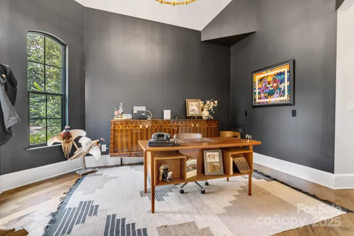 Main floor office with 16' vaulted ceiling