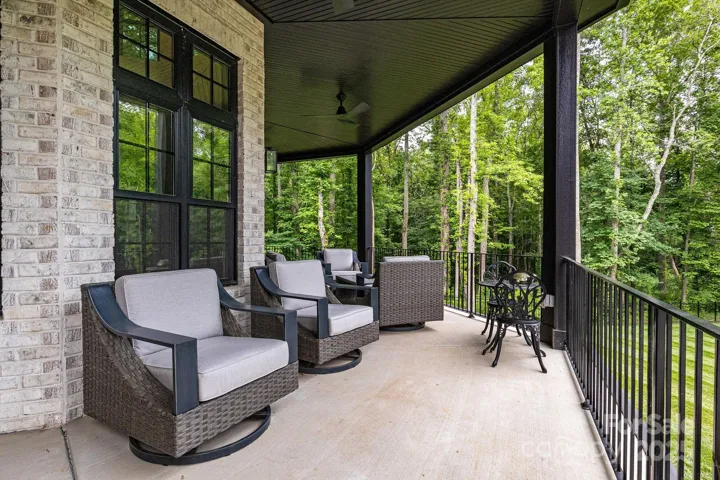 Upper terrace provides multiple seating areas.