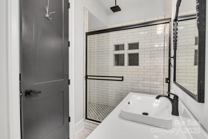 Basement - Full bath with custom tile shower.