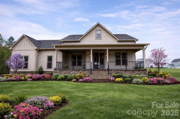 This photo is a rendering of what home could look like with landscaping.