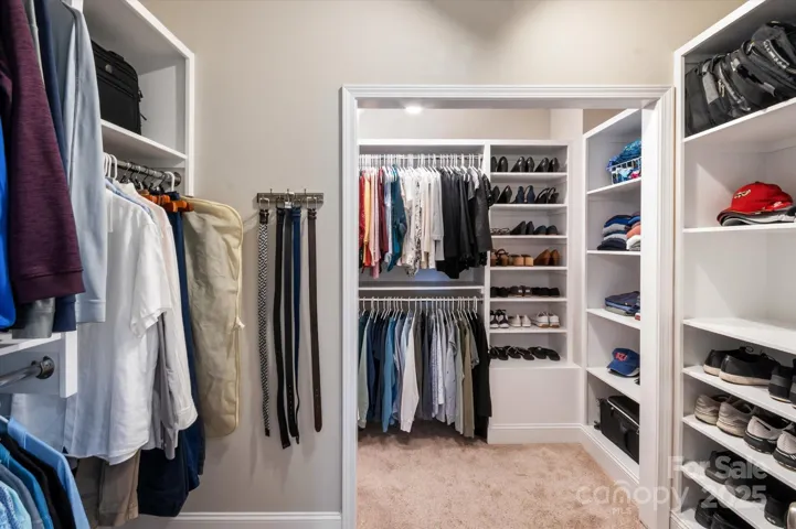 Plenty of storage in this huge primary walk in closet