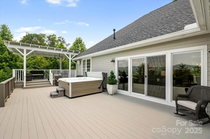Escape to the shade under the pergola and take a nap on the porch swing bed
