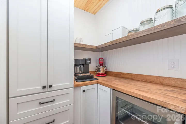 Upper Walk-in Pantry off of kitchen