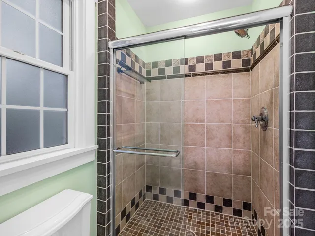 Separate tiled shower in the Primary Bath