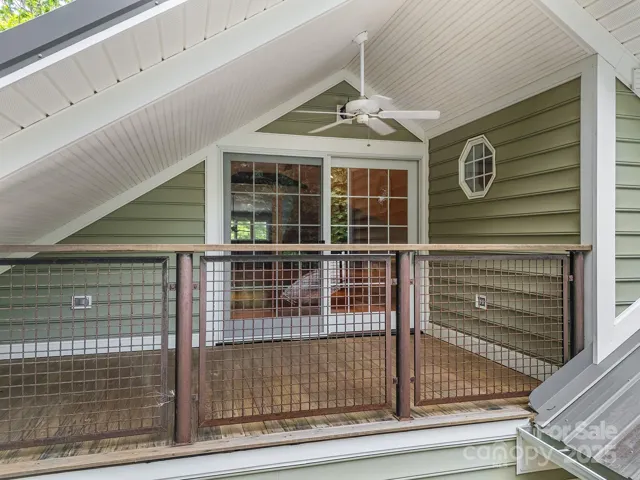 Covered porch on the upper level.