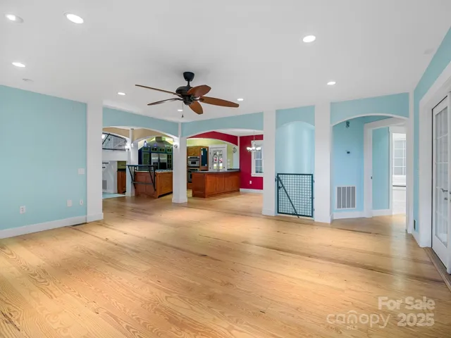 Great room looking toward kitchen and dining