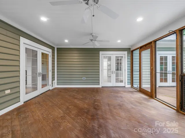 Screened porch has access from the great room and the primary bedroom.