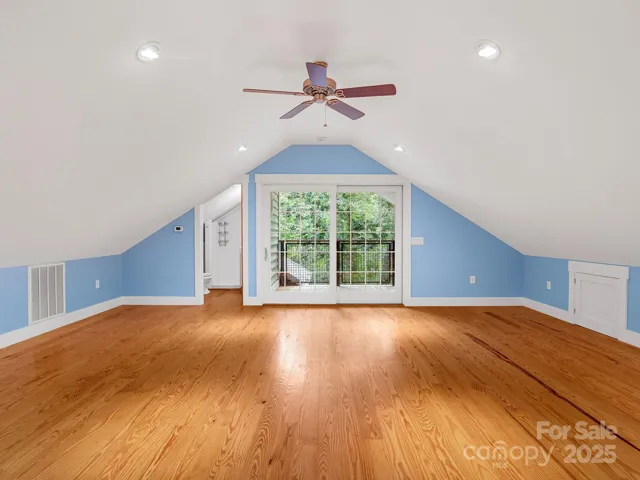 Full bath to the left and doors lead to the covered porch.