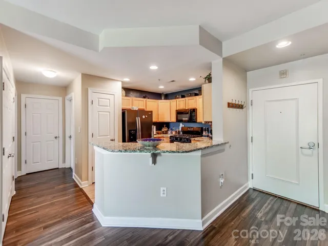 granite counters & large bar height island