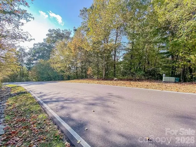 Land frontage is on the Right of the photo