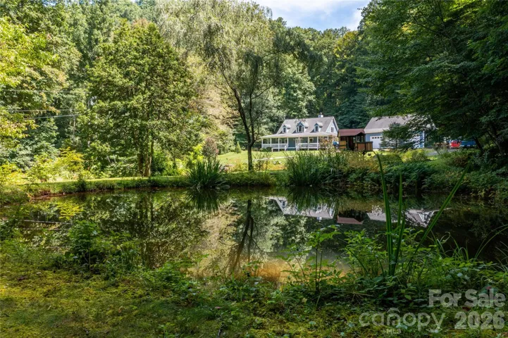View of home and workshop from behind the pond