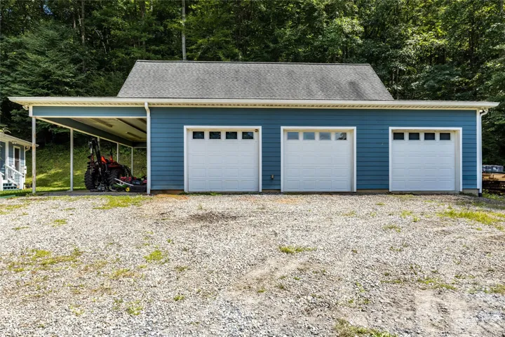 Massive 3 car garage with workshop