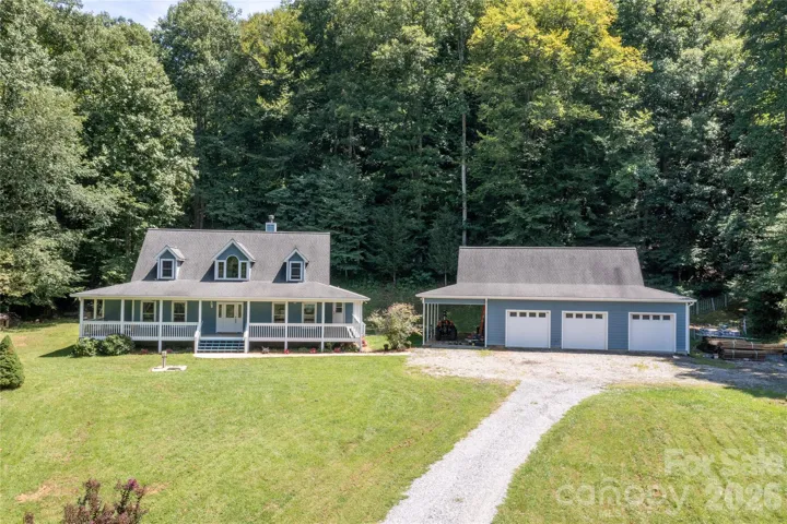 Gorgeous home on 35 acres with massive garage/workshop