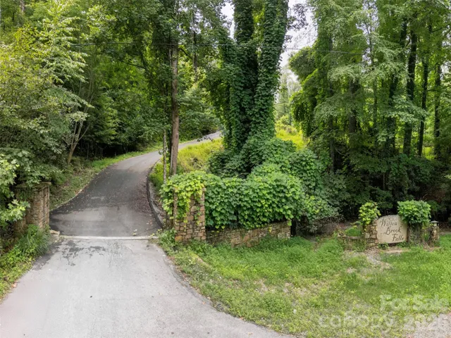 Paved entry into the neighborhood from Willow Rd.