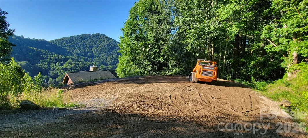 Paved roads up to Lot 33 with gravel rd to be paved in future