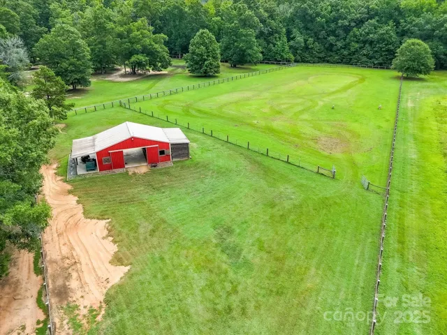 There are 3 pastures with fencing suitable for your equine friends. The fence line on the right is is along the right property border. Property extends into the woodline.Reference 2024 property survey. Approximately 5.7 acres are in pasture and suitable for constructing a home.
