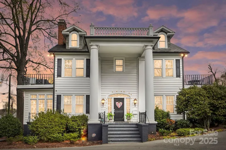 5101 Monroe Road, nestled on a large private lot in the heart of East Charlotte, this historic office offers timeless elegance and modern comfort