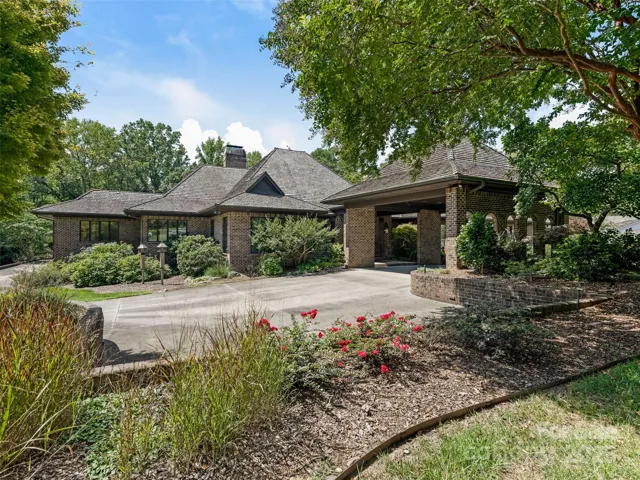 Front entry with circular driveway & porte-cochere