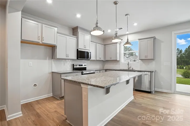 Pictures are of a completed home with same floorplan and is very similar to the home under construction.