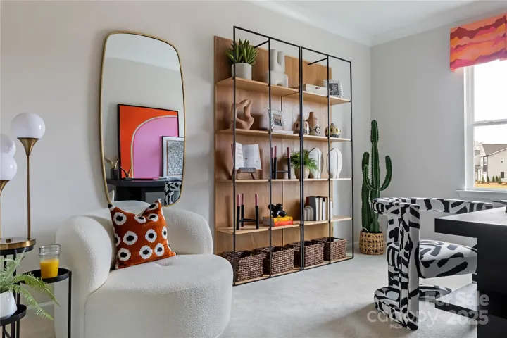 Versatile loft with plenty of natural light.  *Model Photos | Actual finishes, structural selections, and orientation may vary.