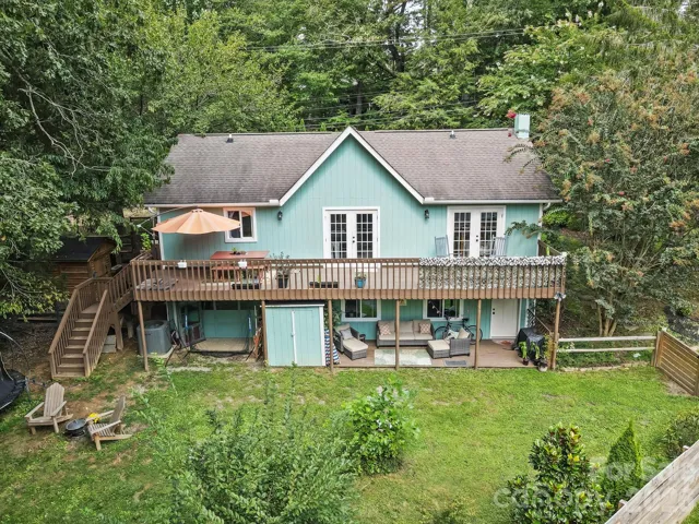 Large fenced yard and deck and patio spaces!