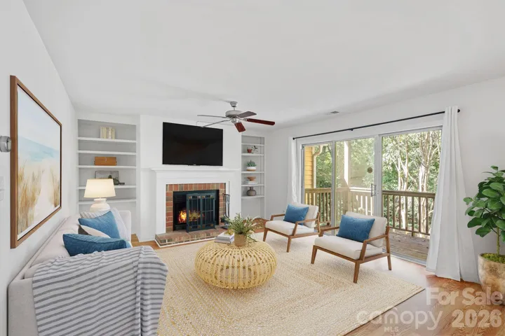 Virtually Staged - living room with built-ins, and fireplace