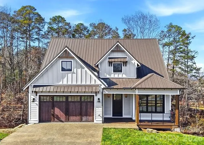 xpansive front porch welcomes you into light-filled living spaces