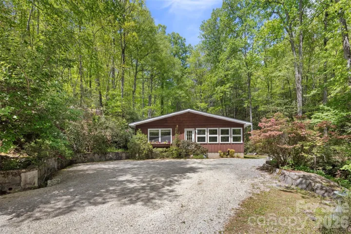 Quaint mountain cottage nestled on over 23 acres!