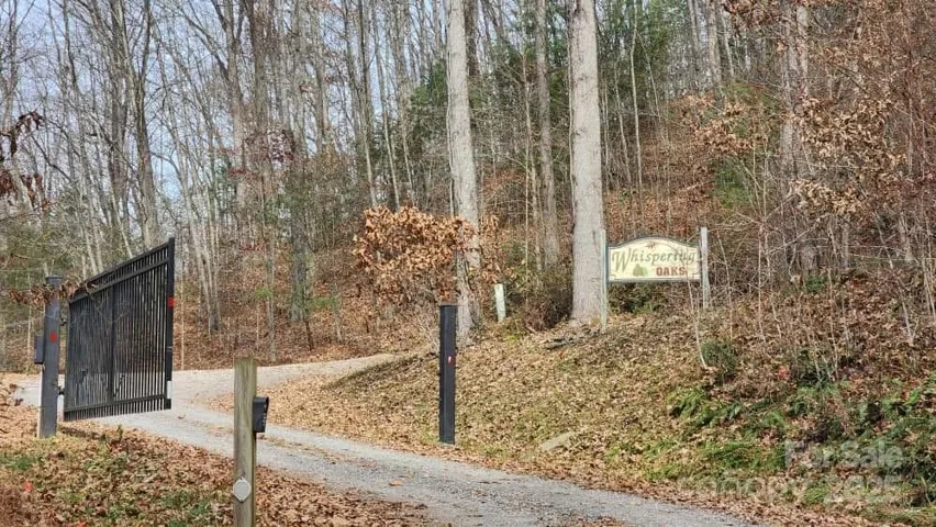 Gated entrance to Whispering Oaks.