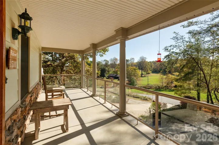 Glass panels on front porch allow you to enjoy the views