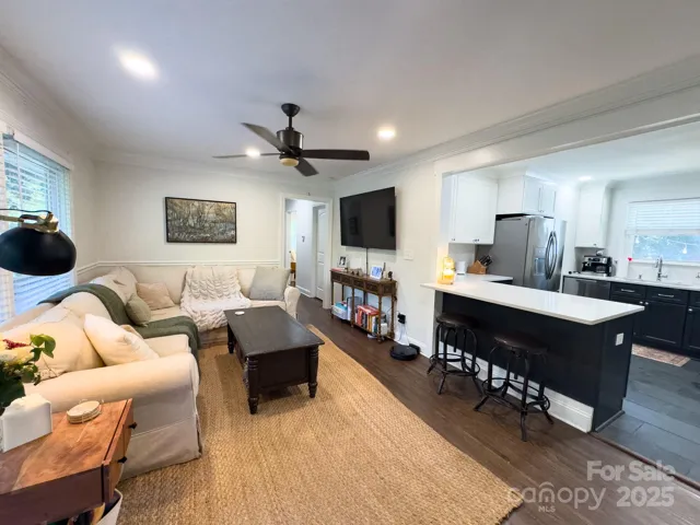 open floor plan with kitchen bar