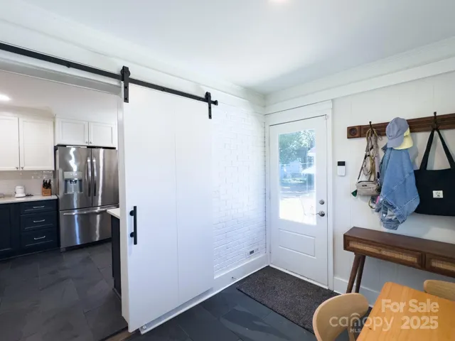 mudroom with breakfast room
